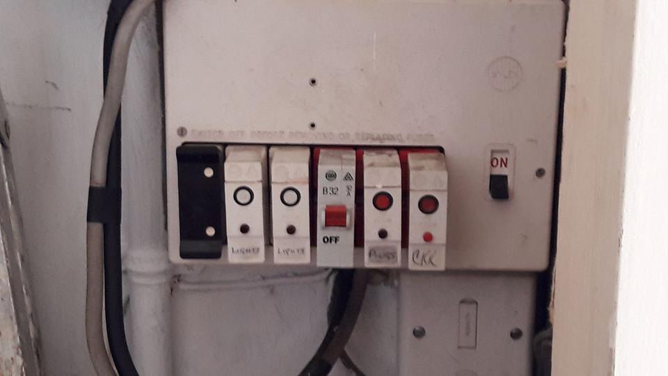 old type fuse board image in need to upgrading to a new up to date unit by a qualified electrician in Bristol area